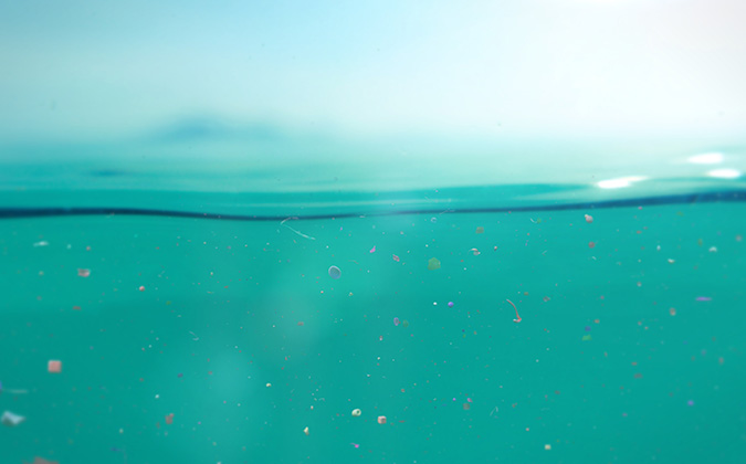 microplastics floating in water, underwater micro plastic pollut