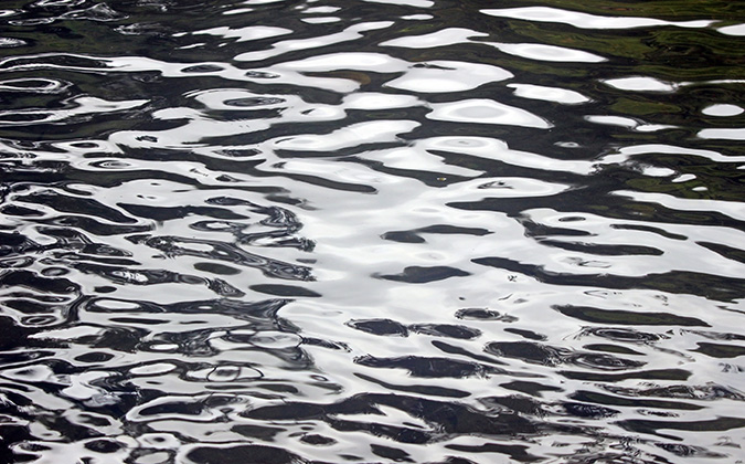 Shiny abstract monochrome water ripple pattern texture